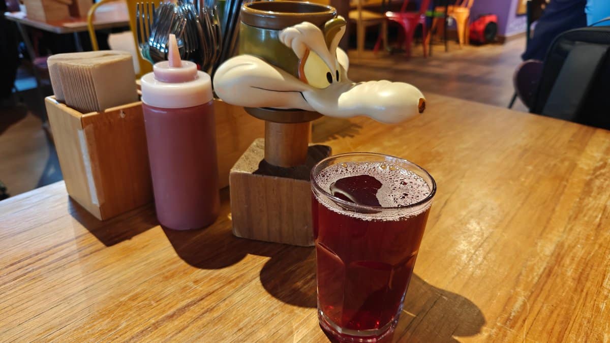 Tall iced drinks on timber table