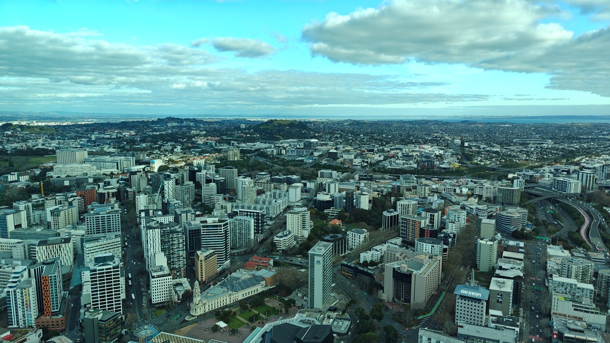 The city with the harbour bridge crossing behind