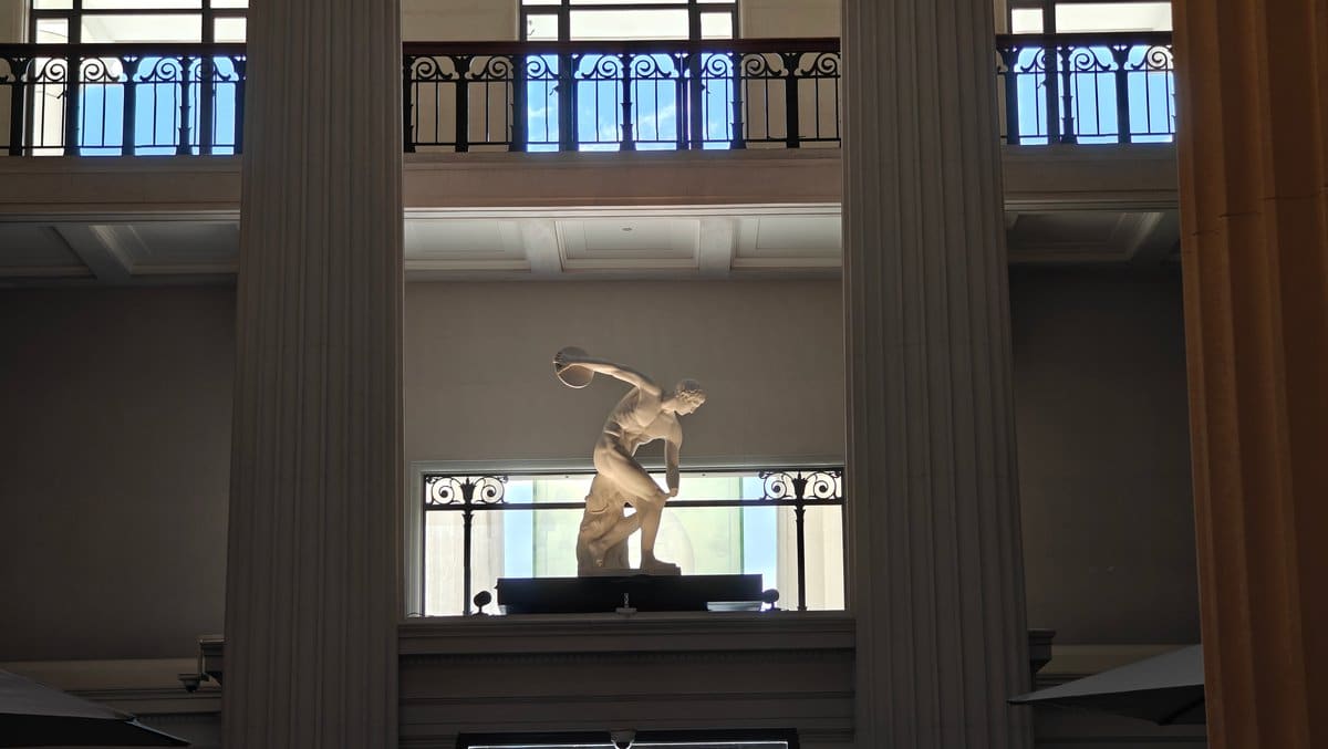 The foyer with a classical statue set in