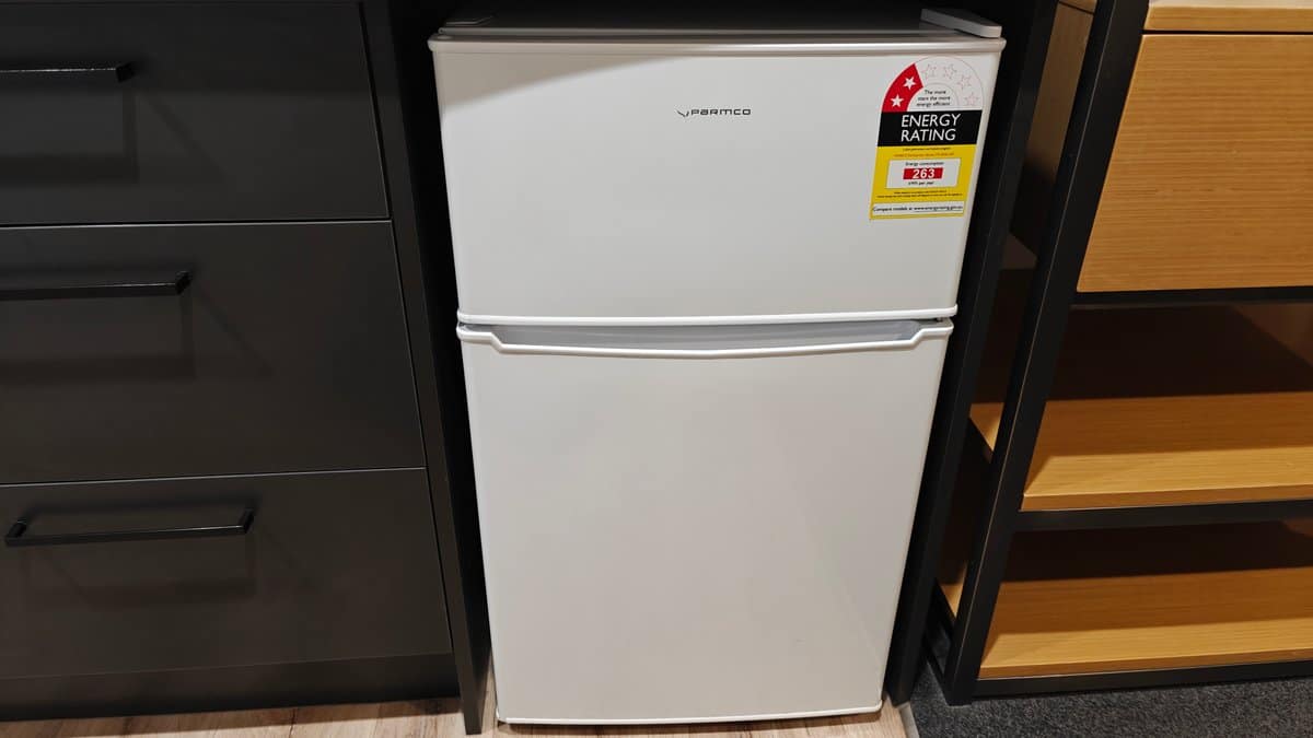The fridge freezer standing open in the kitchen