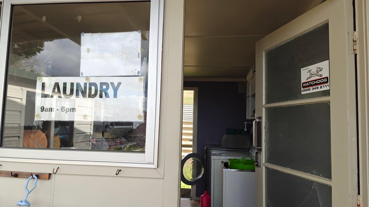 The guest laundry door with a LAUNDRY 9am