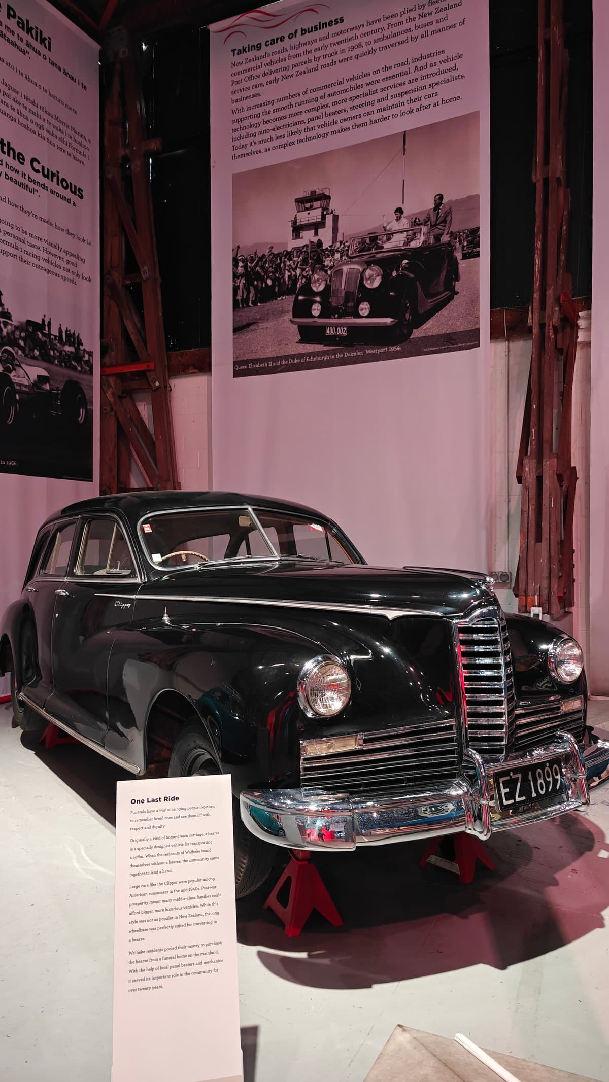 The hearse with its interpretive panel standing beside