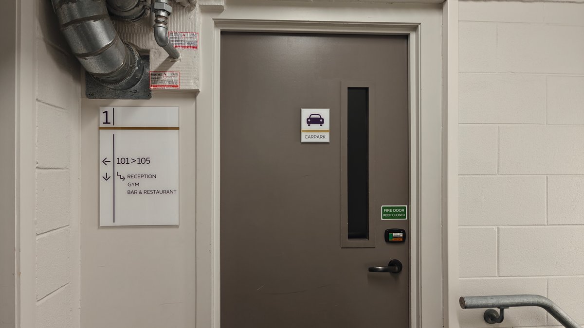 The lift lobby door inside the car park