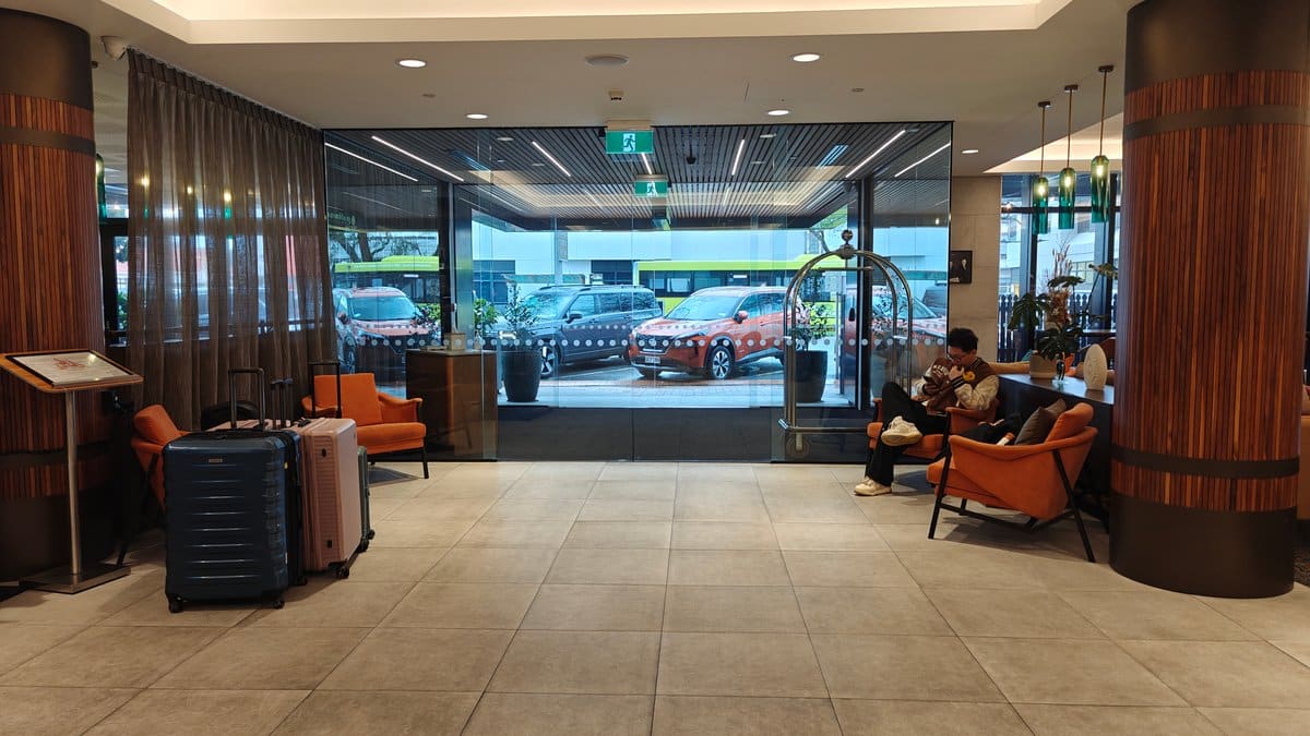 The lobby lounge with seating set against the