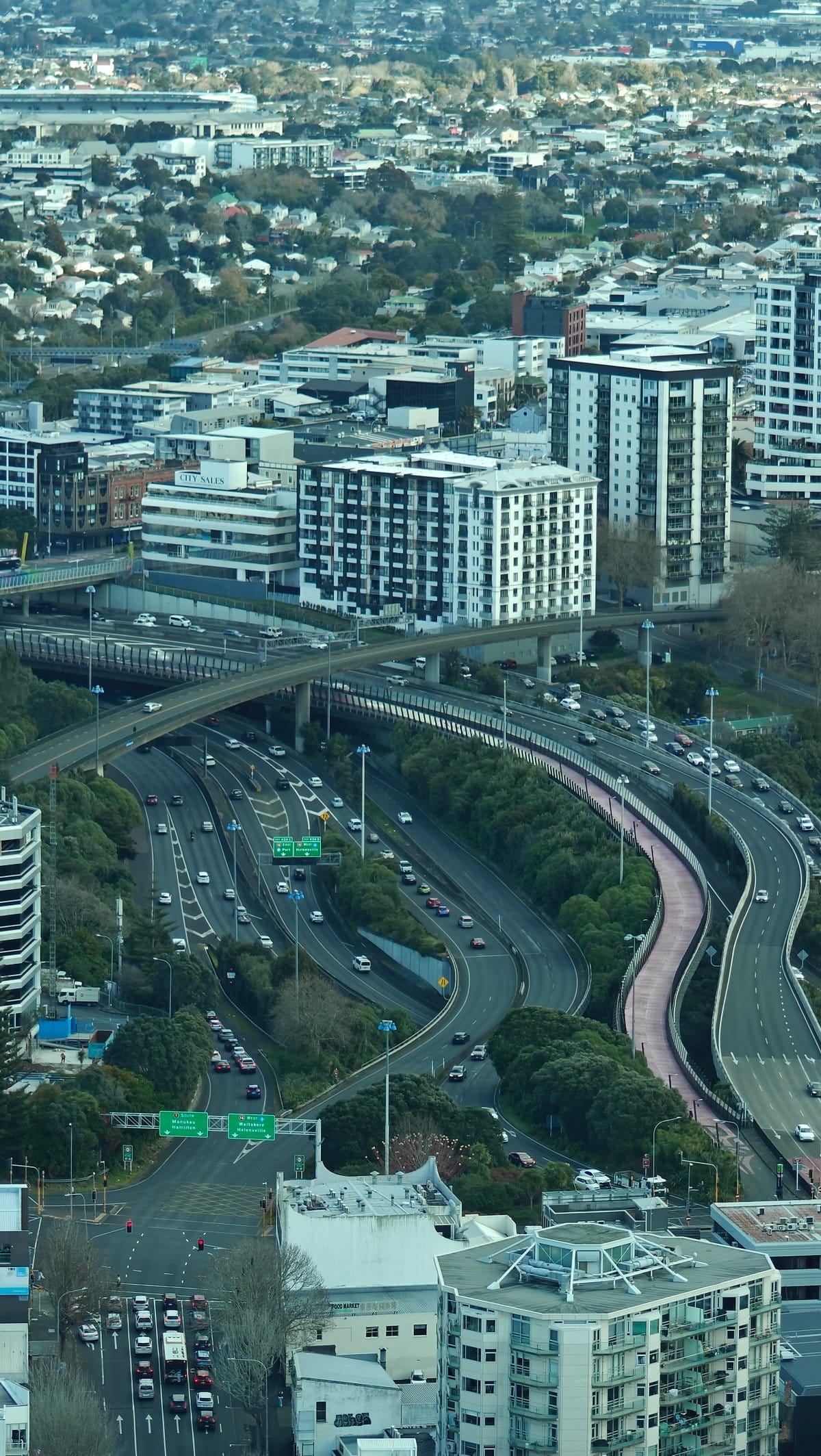 The motorway lanes and the towers stacked along
