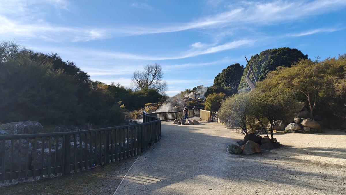 The path along the fence past a mounded