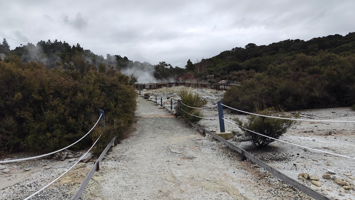 The path running through steaming ground with the