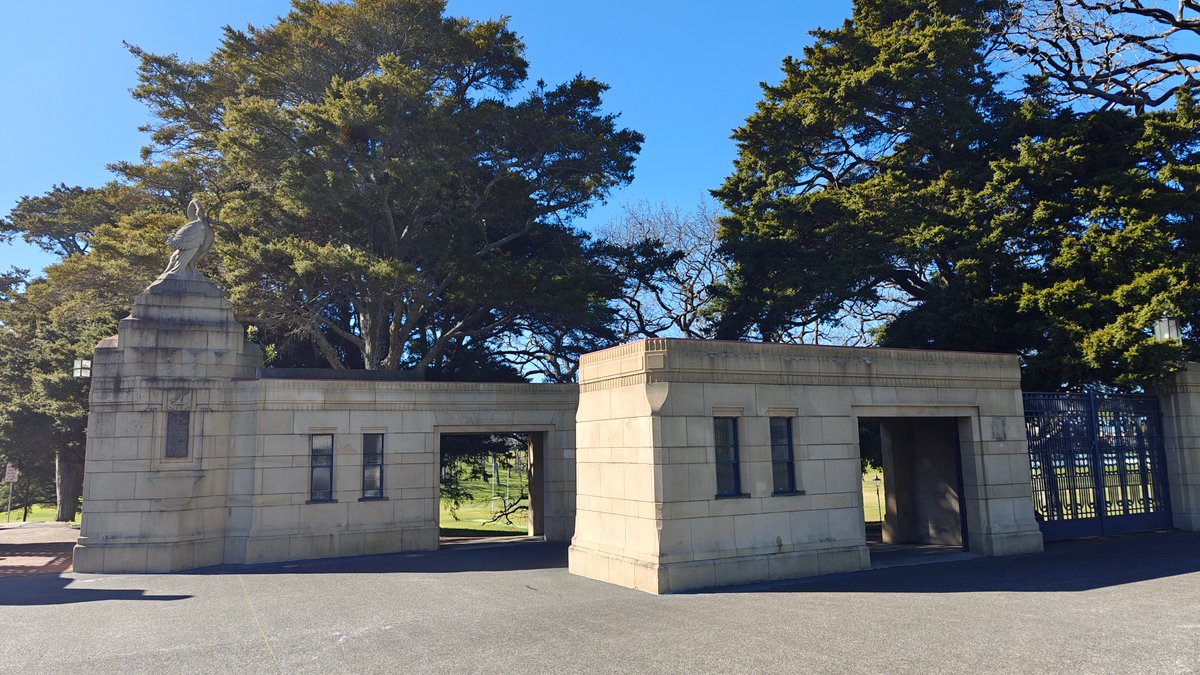 The stone gate lodges either side of the