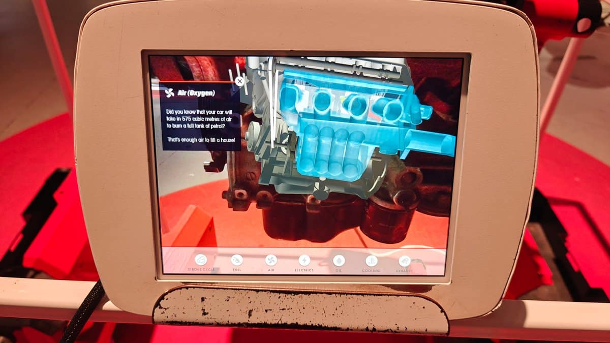 The tablet screen showing an animated cutaway of