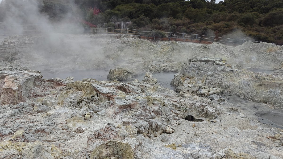 Thick steam over sinter terraces