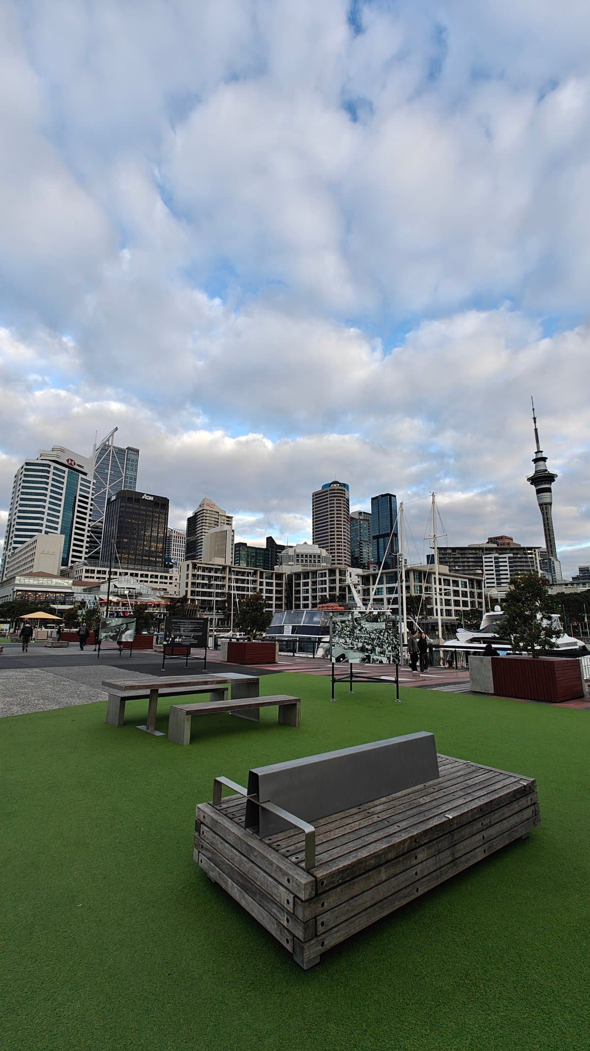 Timber bench facing the city skyline