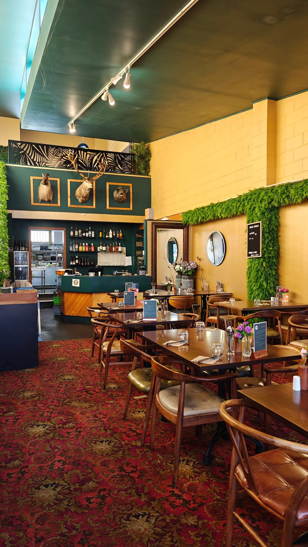Timber tables and bentwood chairs