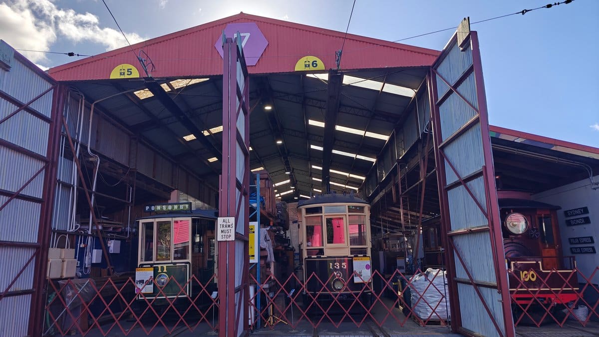 Trams under restoration in barn