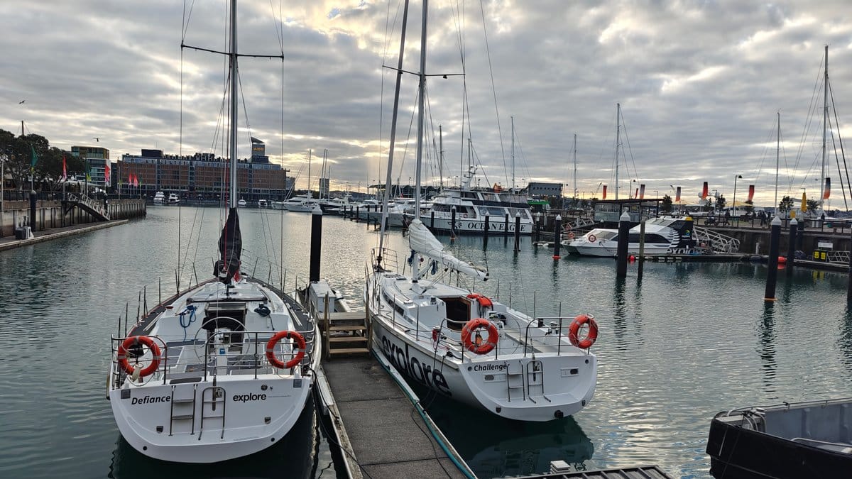 Twin white yachts at the quay