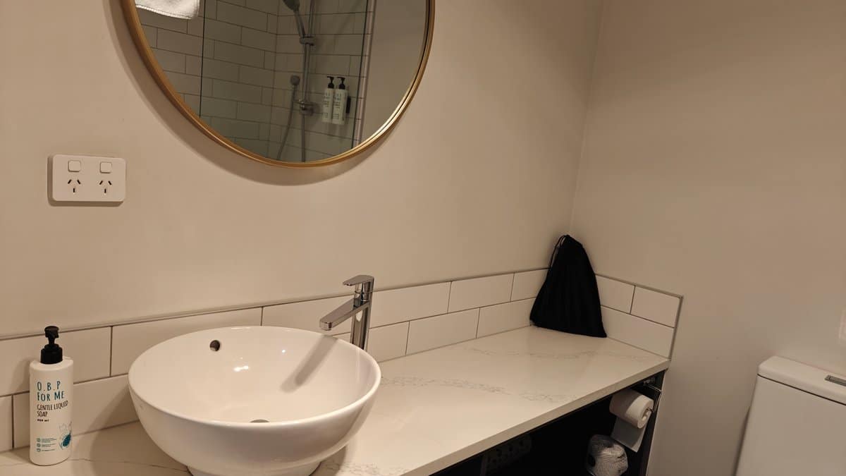 Vessel basin and round mirror