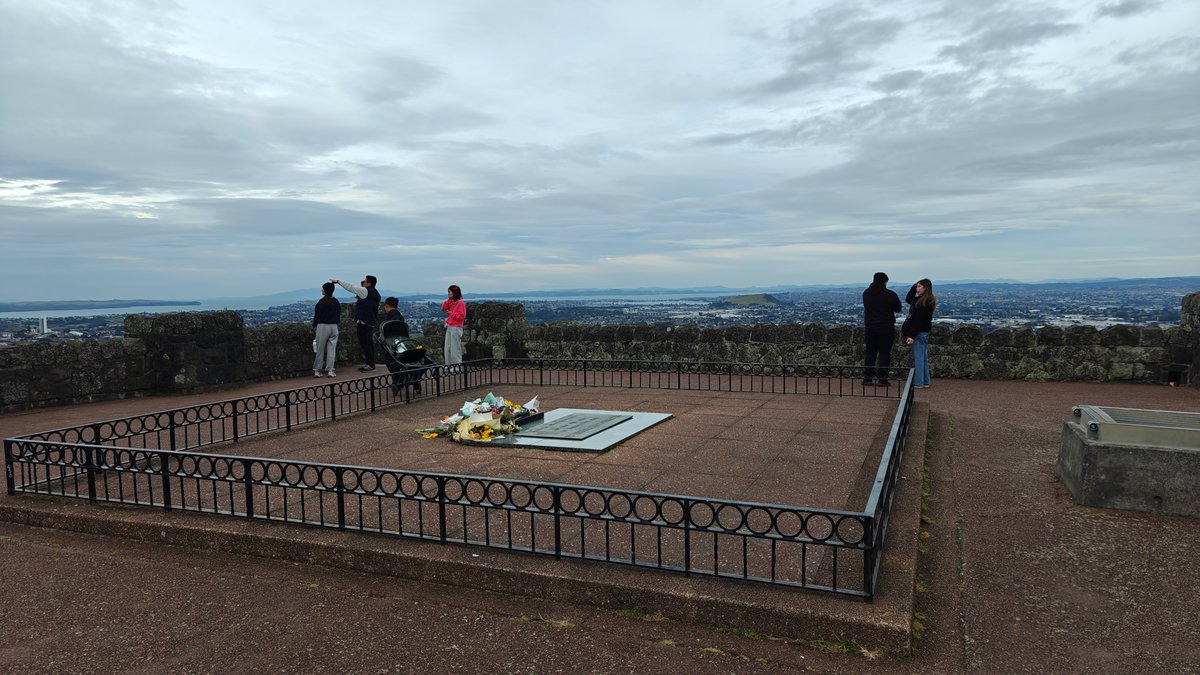 Visitors gathered along the summit railing
