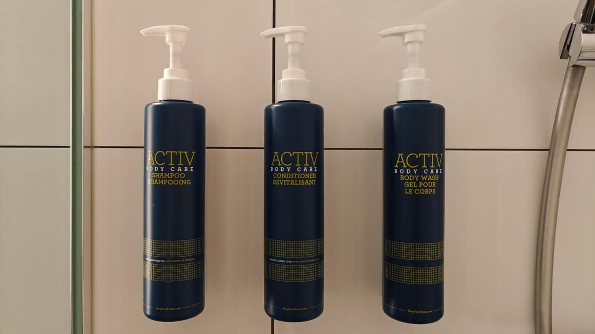 Wall-mounted shower dispensers