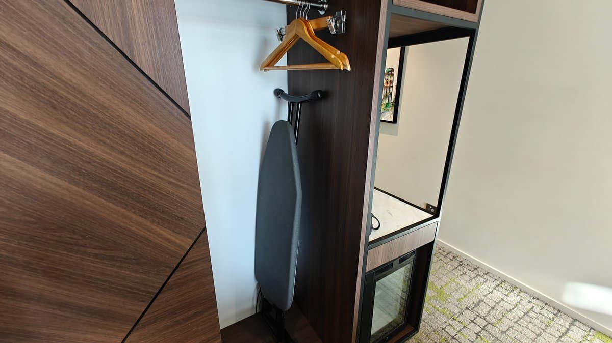 Wardrobe hangers and ironing board