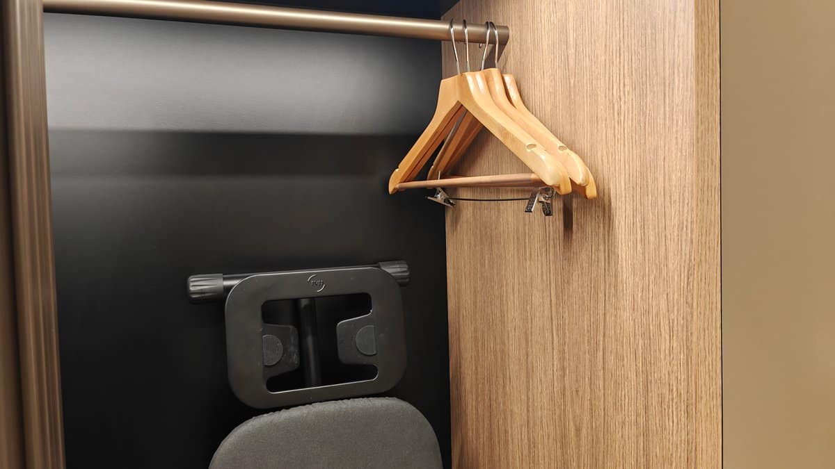 Wardrobe with hangers and stand