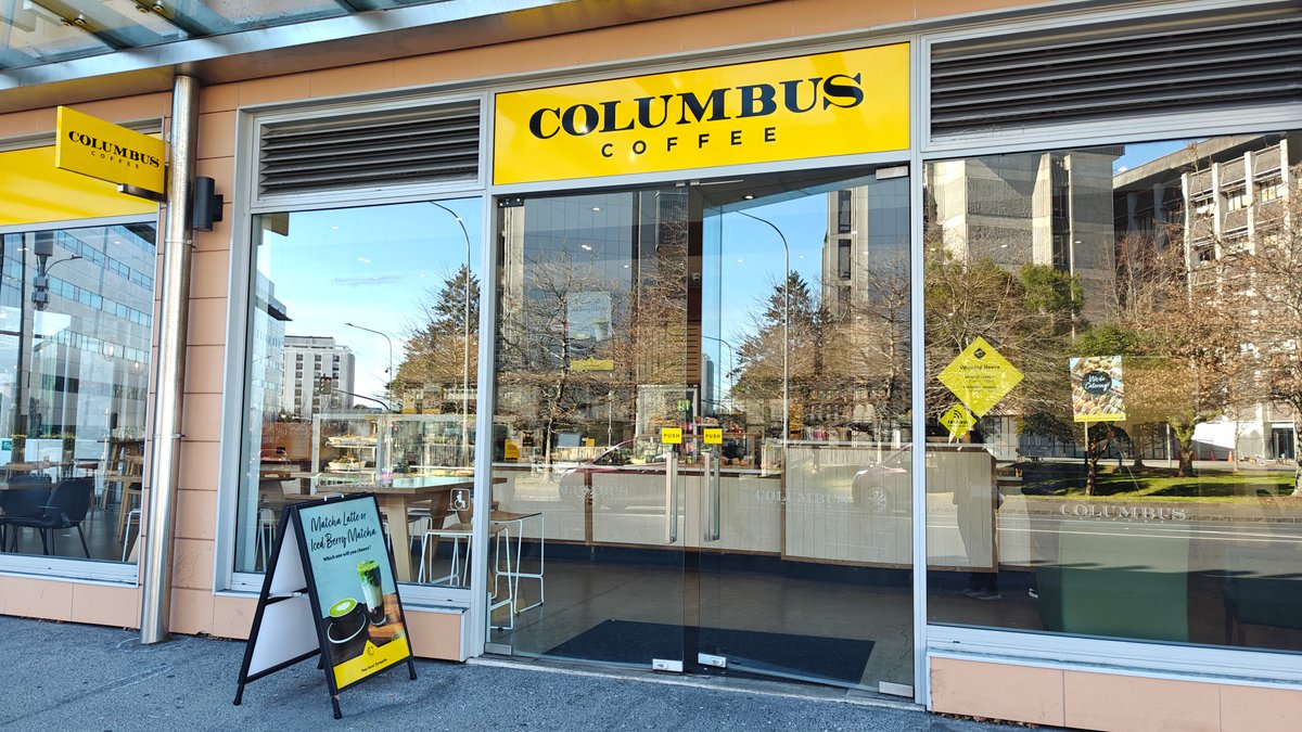Yellow Columbus Coffee shopfront sign