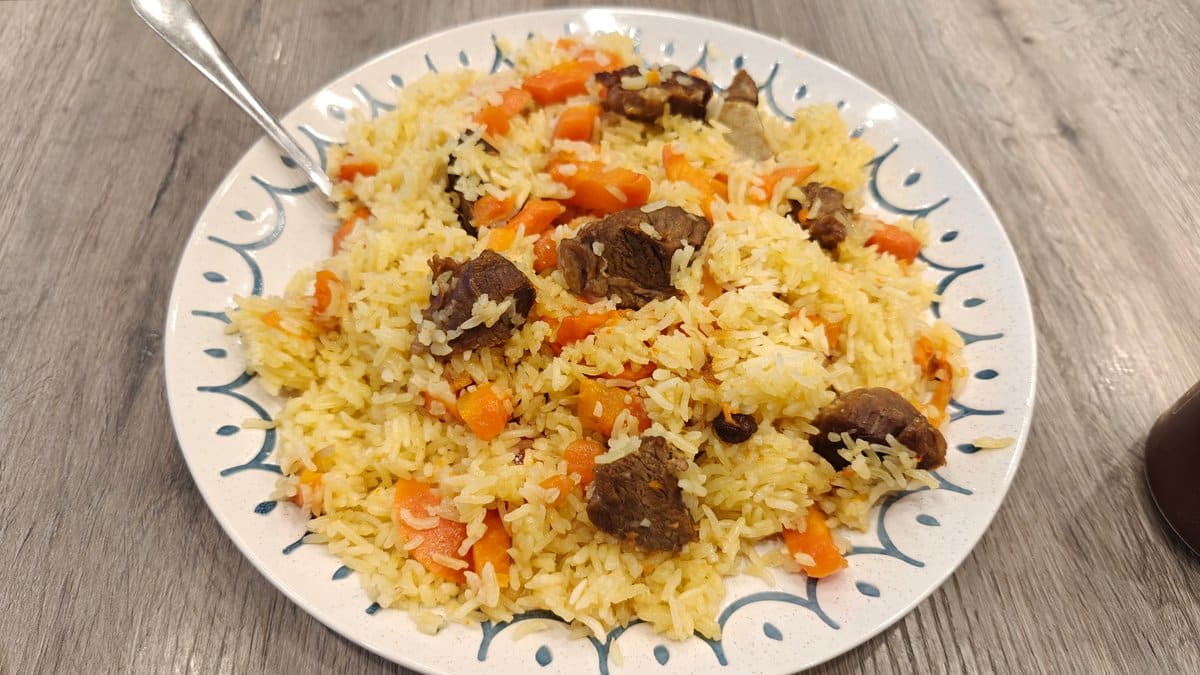 Yellow pilaf rice with braised beef